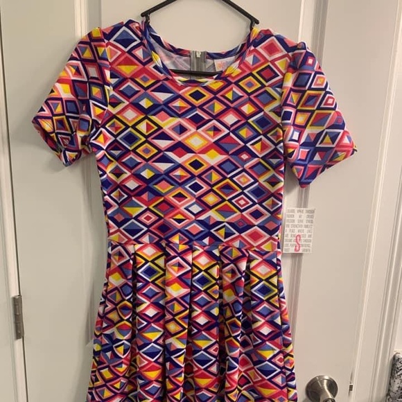 LuLaRoe Dresses & Skirts - NEW LulaRoe Amelia Dress - size small. Never worn. Still has tags.